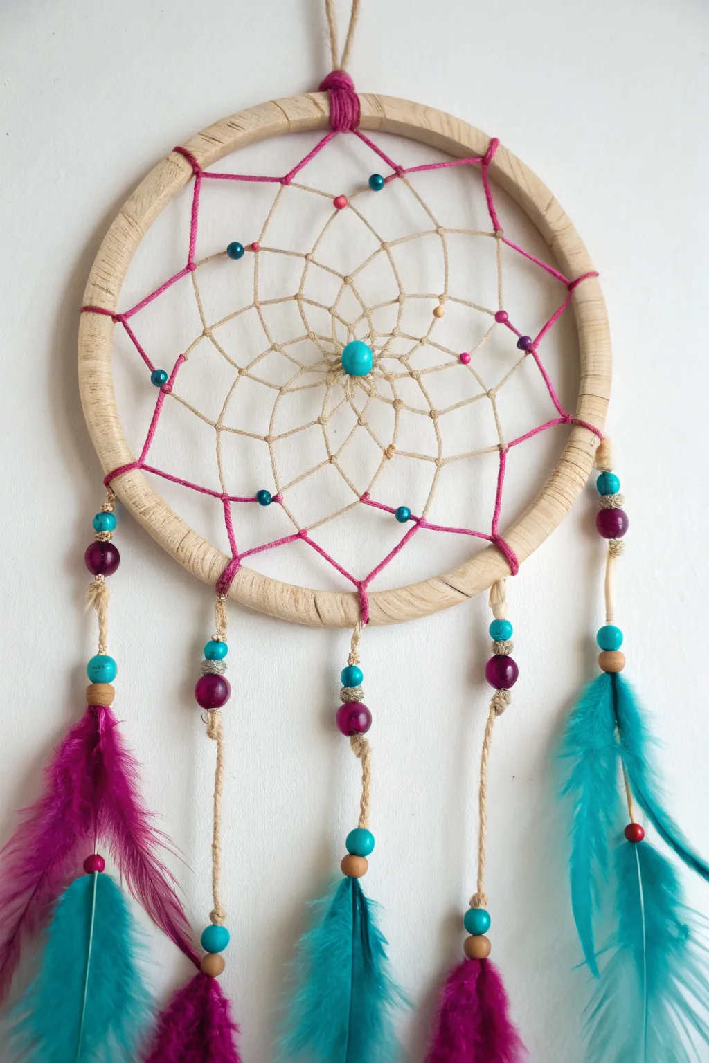 Craft your dreams: Dive into DIY dreamcatchers with bold colors and natural beauty. 🌿✨ #MinimalistBoho #CraftingMagic