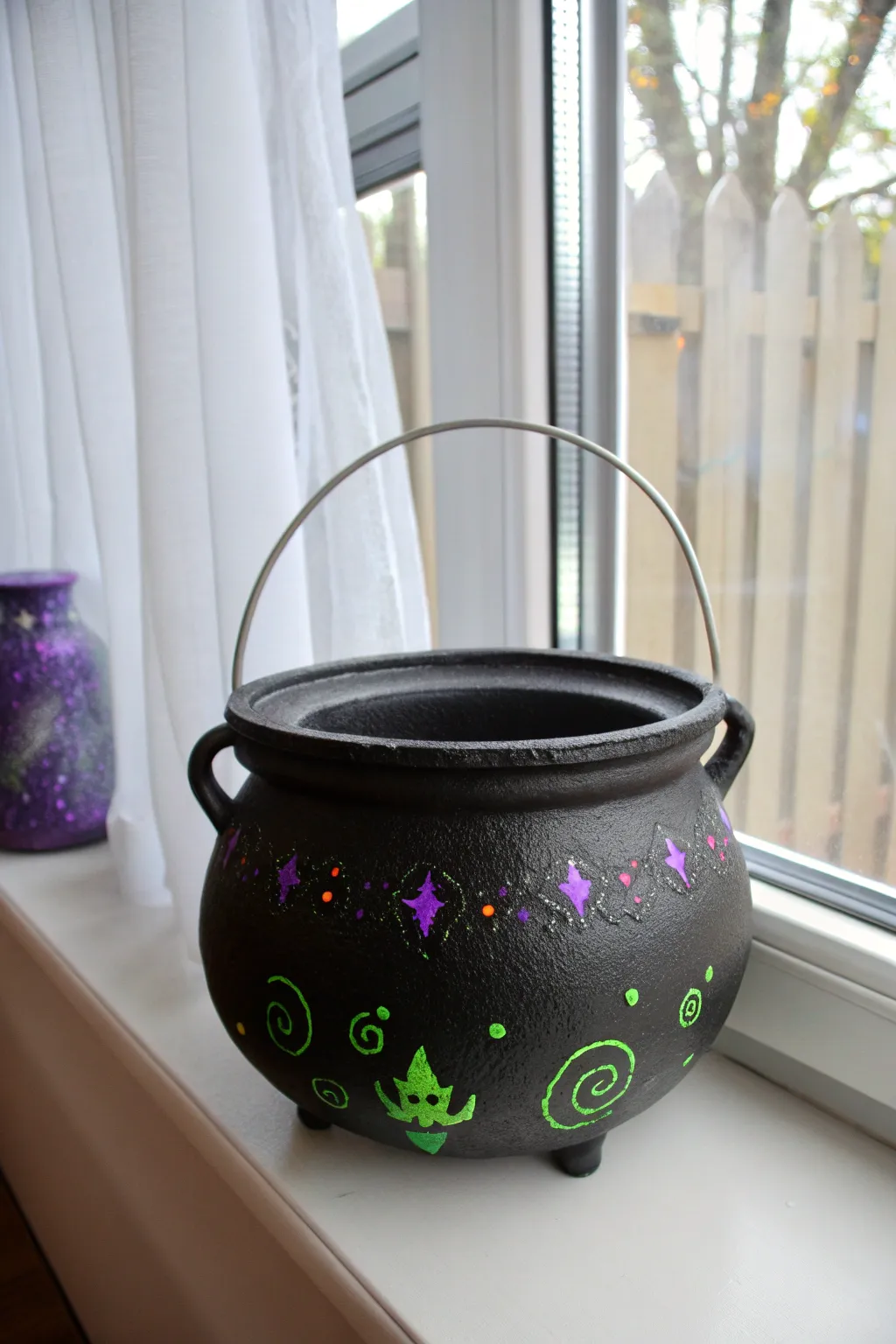Capture the magic of Halloween with a chic, minimalist witch's brew window display. 🧙‍♀️✨ #ScandiBoho #DIYHalloween