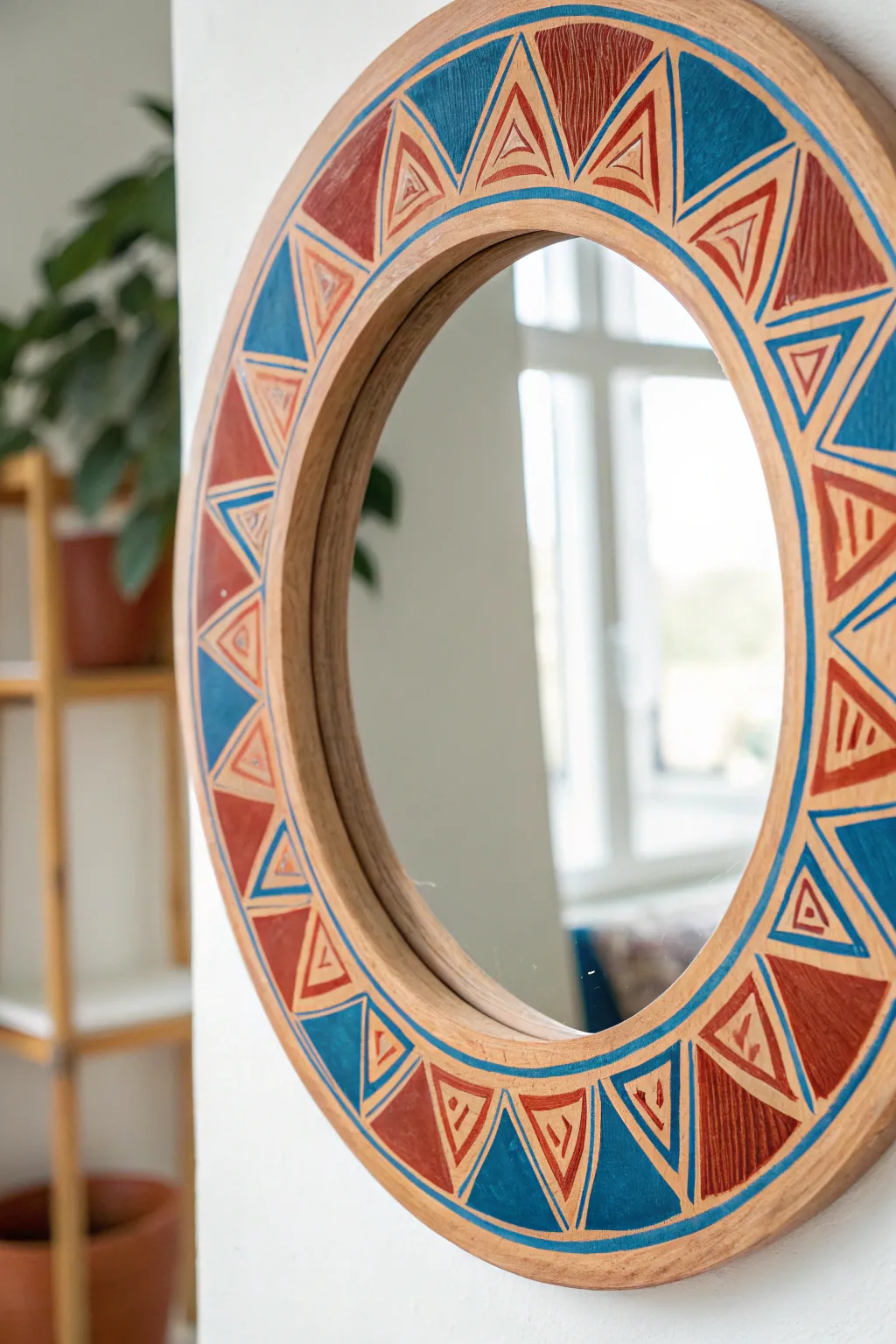 Transform your space with a DIY painted mirror frame: bold patterns meet minimalist charm.
