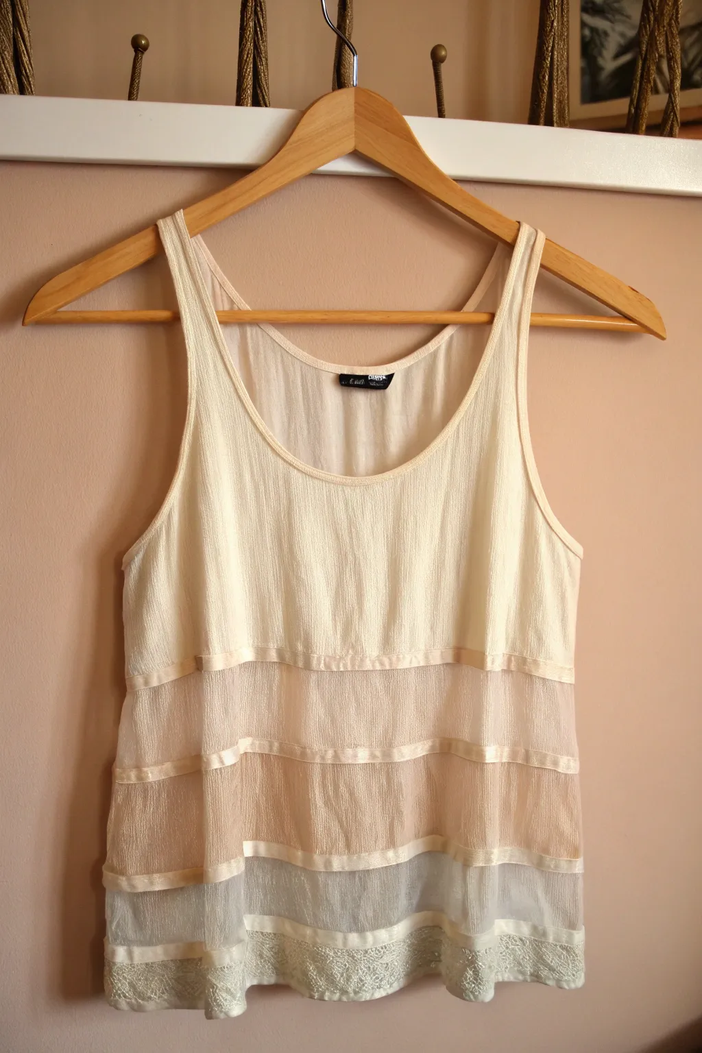 Elevate your style with a layered look: Discover the elegance of a DIY tank top with sheer overlays.