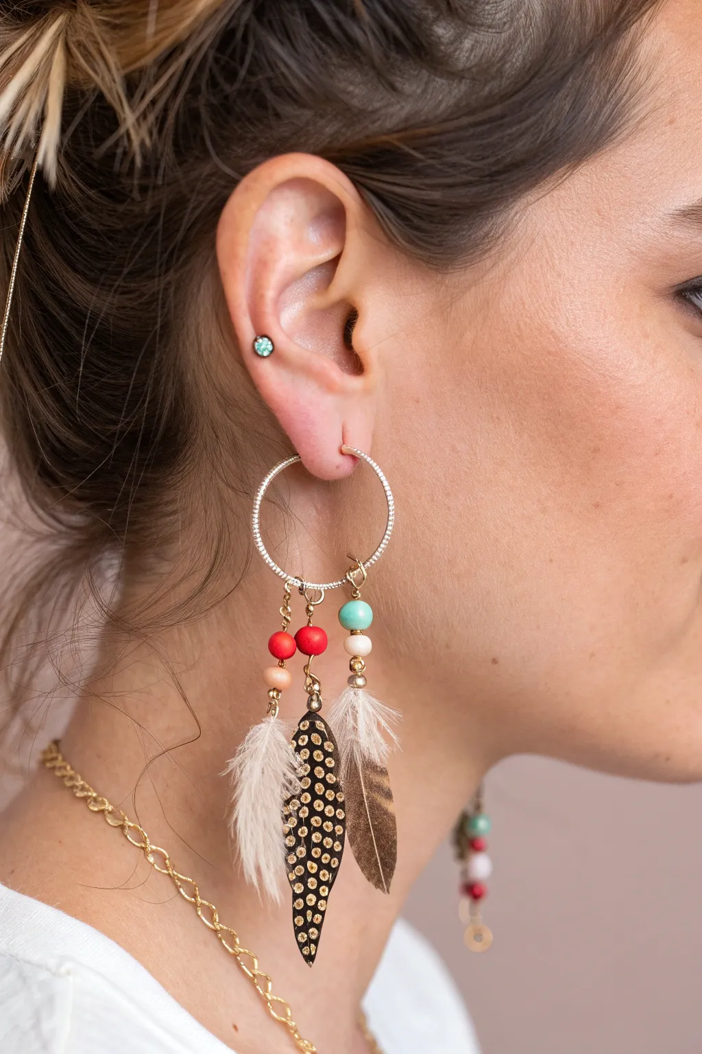 Embrace the art of asymmetry with stunning earring combinations that turn heads.