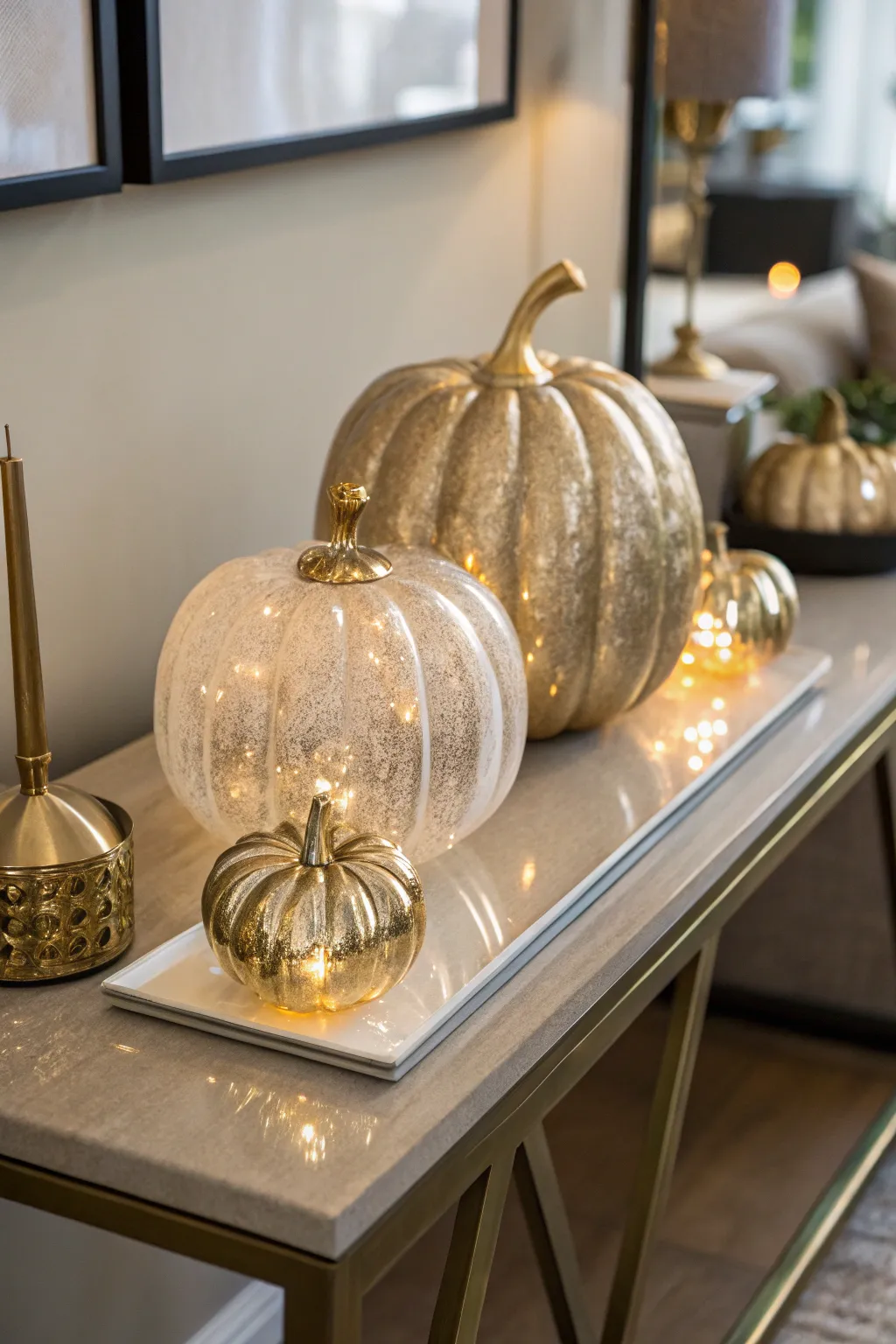 Mixing glass pumpkins with metallics for a luxurious feel.