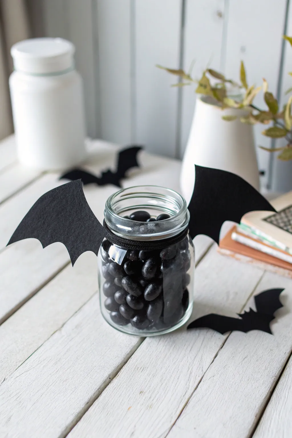 Elevate your Halloween decor with these charming Batty Mason Jars—where minimalist elegance meets spooky chic!
