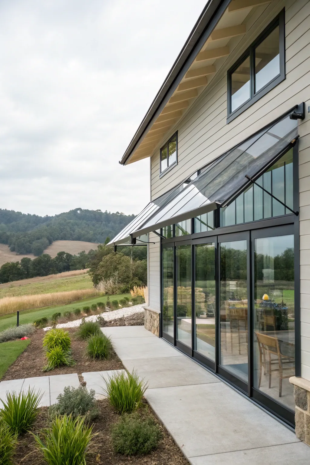 Innovative glass awnings provide protection while maintaining stunning views.