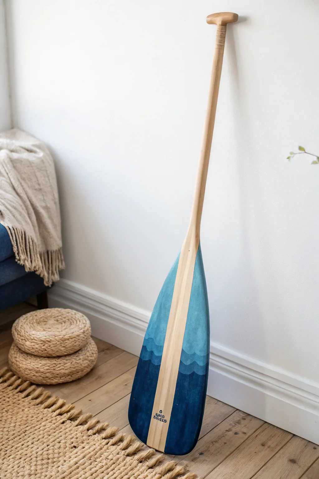 Transform your space with the serene beauty of gradient hues in a handcrafted canoe paddle.