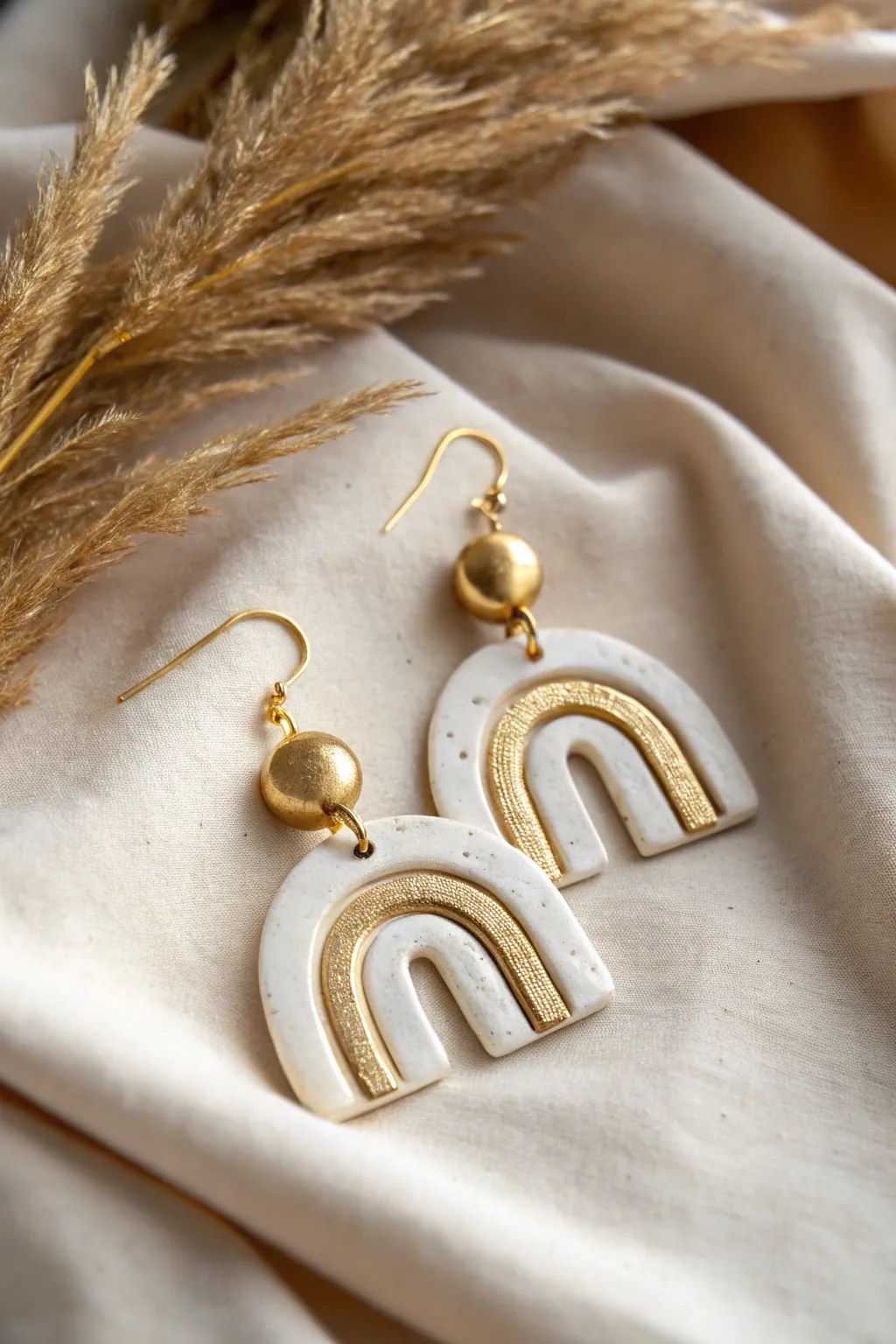 Elevate your style with a touch of gold glamour in minimalist elegance.