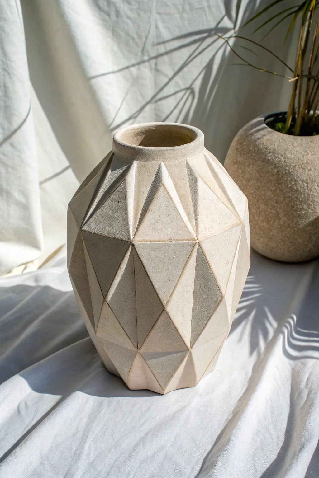 Elevate your decor with the elegance of geometric vases — where simplicity meets artistic flair.