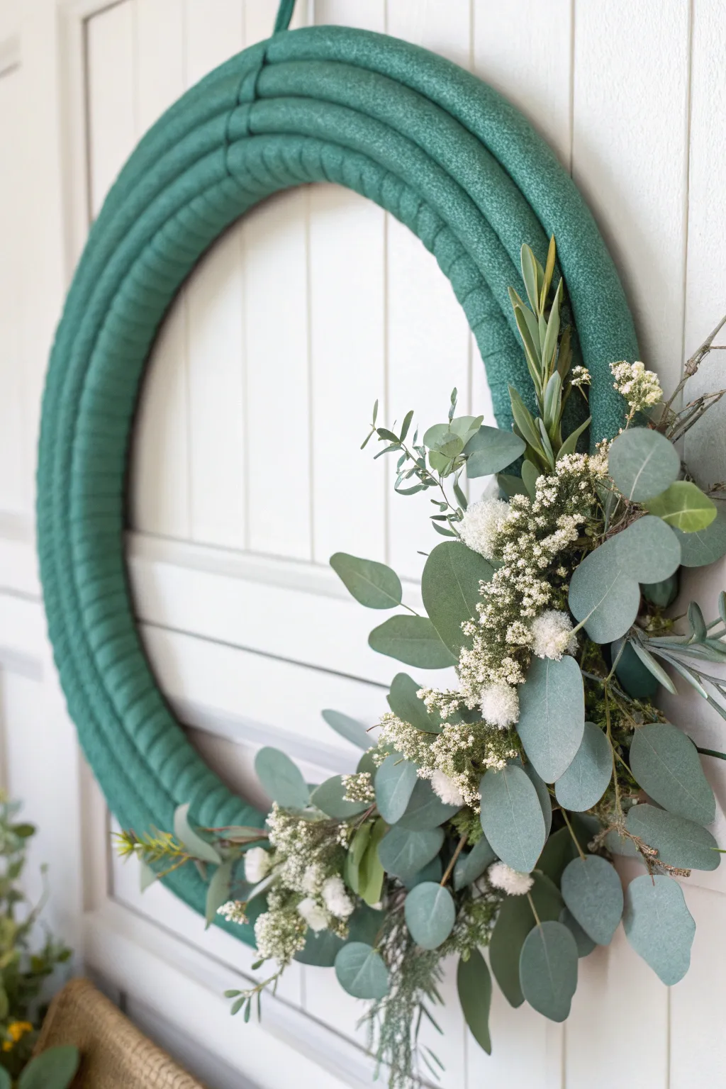 Transform pool noodles into stunning wreaths that add a touch of elegance to your home decor. #RepurposeCreatively