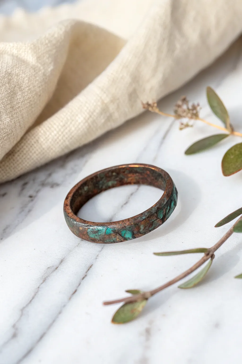 Embrace rustic elegance with this beautifully aged copper ring, where simplicity meets artistic charm.