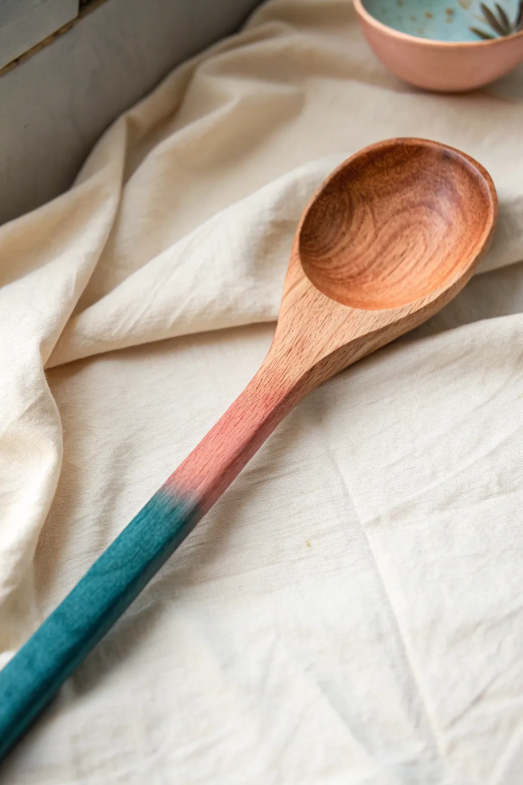 Transform your kitchen with the enchanting beauty of an ombre fade on wooden utensils. Simple elegance meets vibrant style.