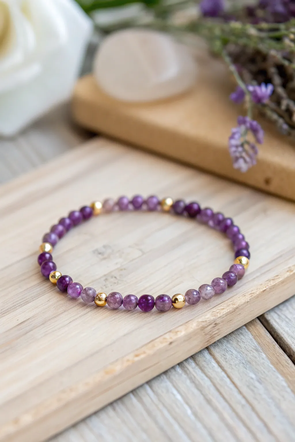 Embrace the calming energy of amethyst with this elegantly crafted gemstone bracelet.