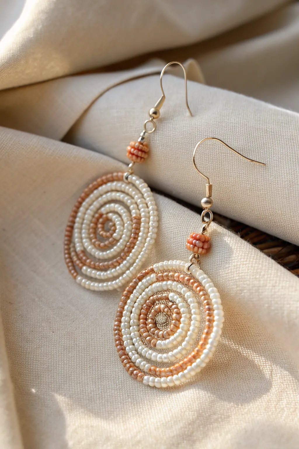 Discover the elegance of spiral beadwork - a twist of artistry in every earring.