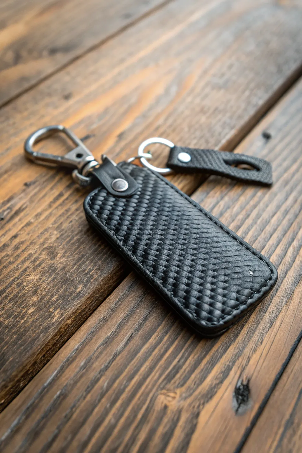 Elevate your entryway with a touch of modern craftsmanship: the minimalist carbon fiber key holder.