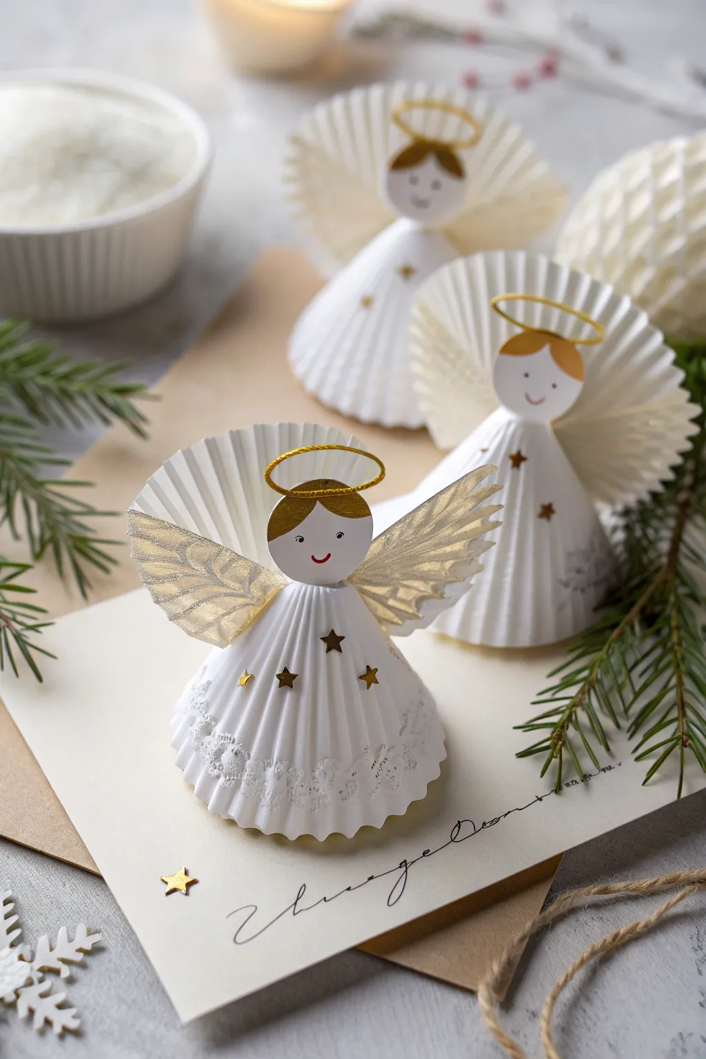 Crafting holiday magic: Cupcake Wrapper Angels bring a touch of handmade charm to your Christmas greetings.