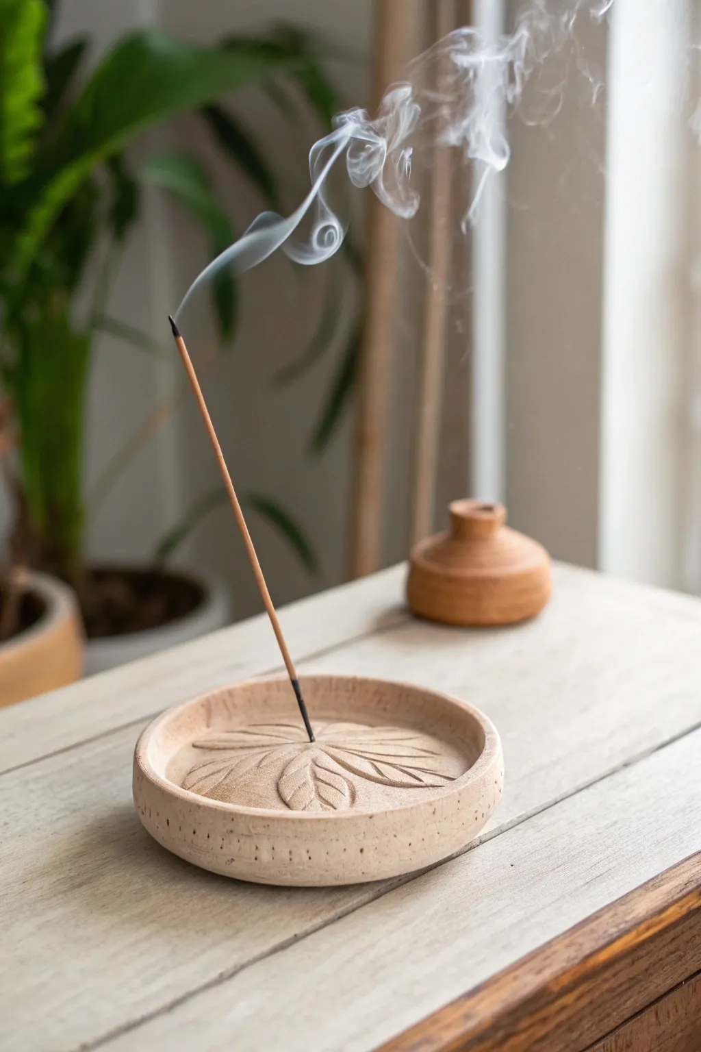 Elevate your space with the natural elegance of a handmade clay incense holder. Perfect for a serene evening ritual.