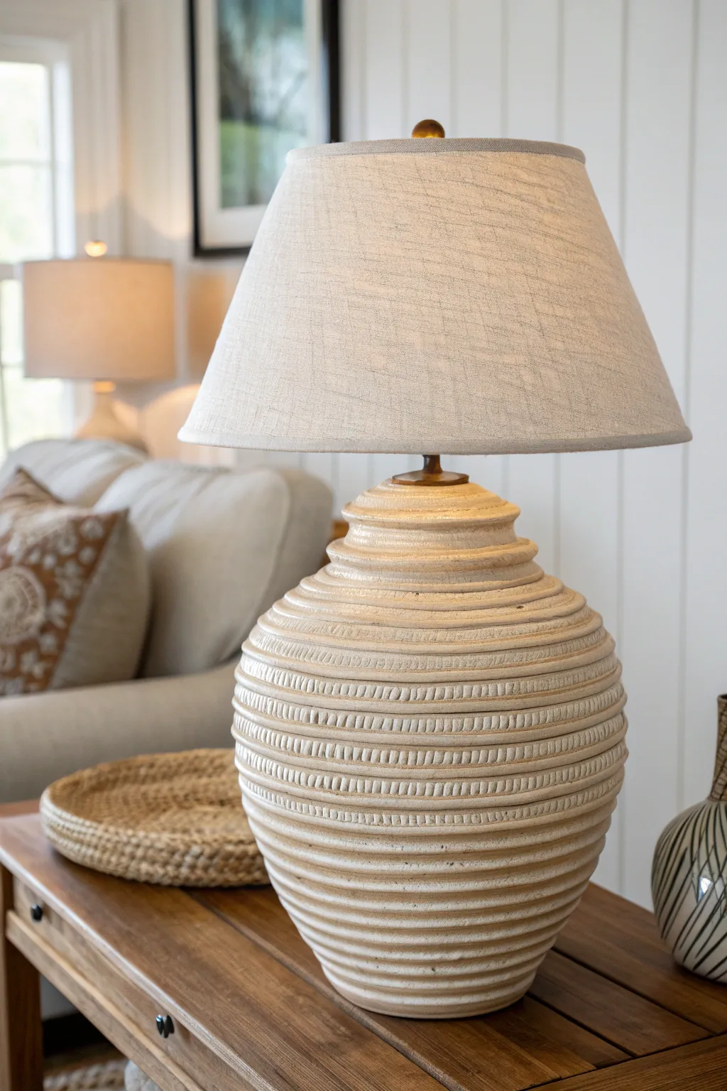 Illuminate your space with the natural elegance of a coil pot lamp, where craftsmanship meets minimalist charm.