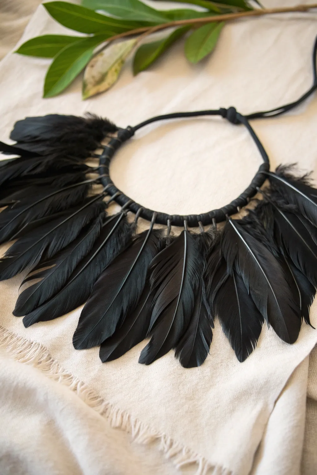 Elevate your style with a handcrafted feathered collar that whispers elegance and mystery.
