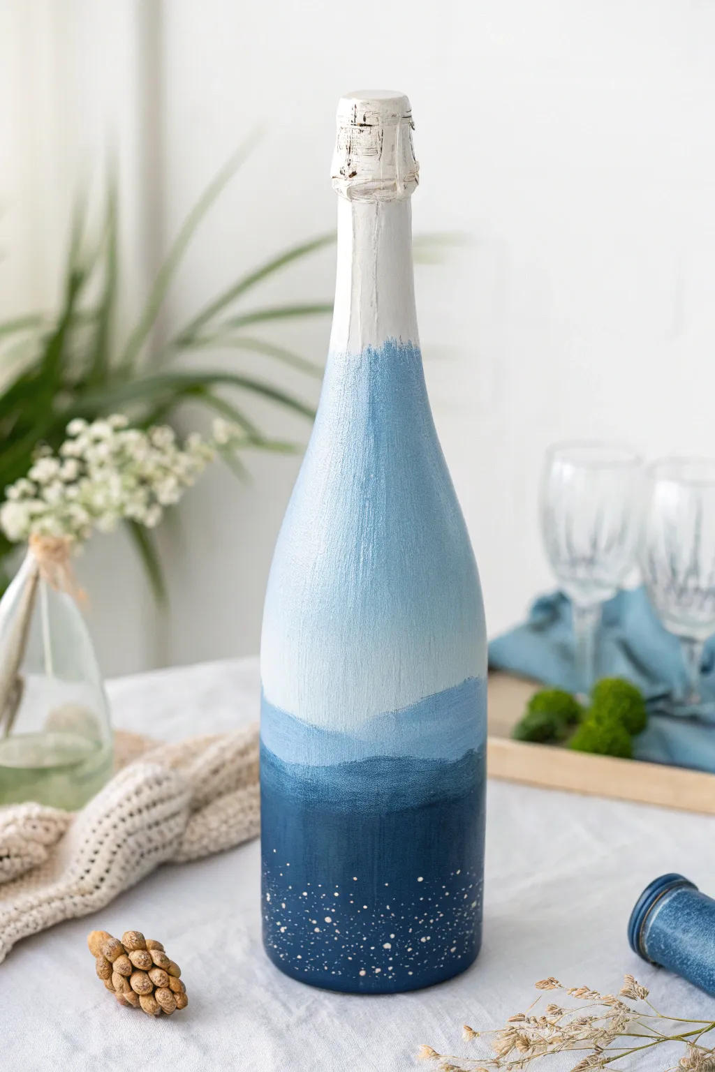 Transform your celebrations with a mesmerizing ombre champagne bottle, perfect for a nautical-themed event.