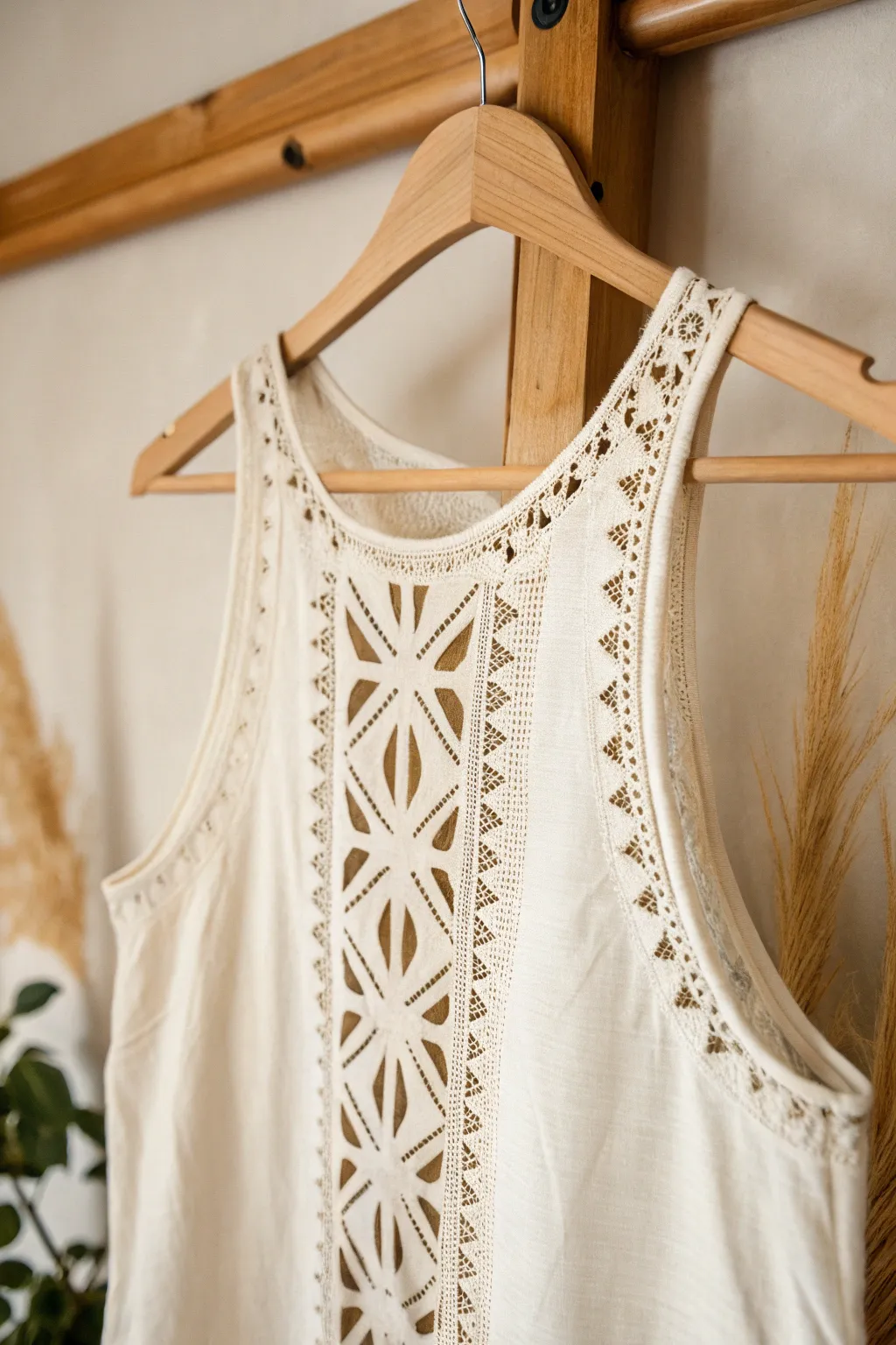 Transform your tank top with stunning geometric cutouts for a chic and artistic look!