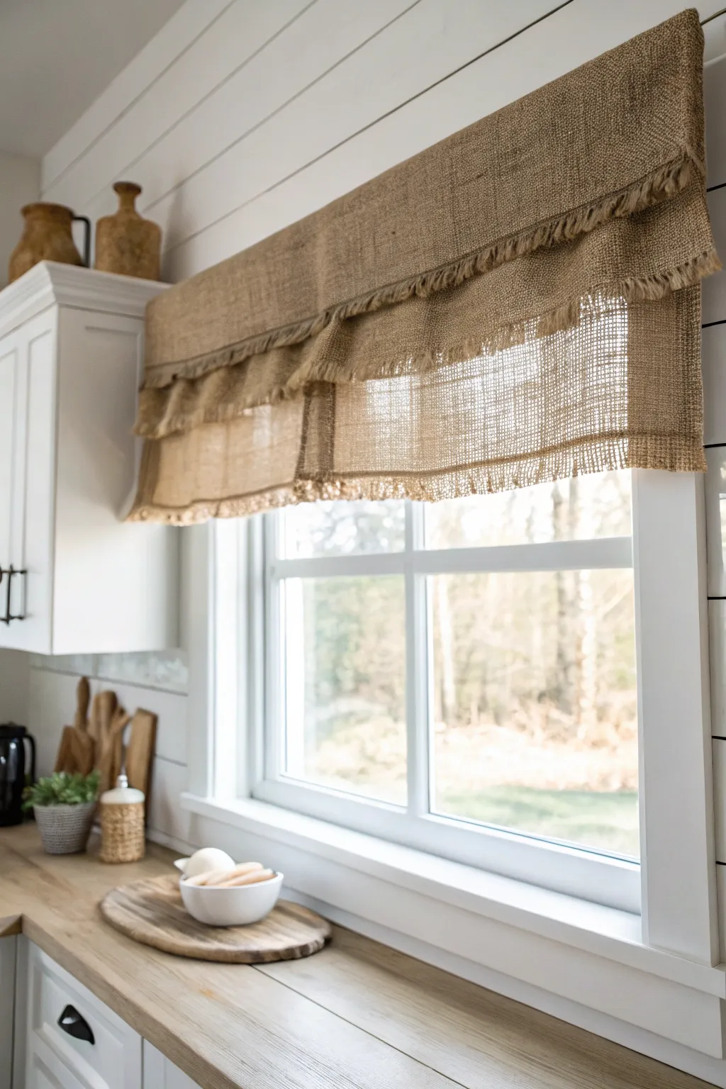 Add a rustic touch to your home with a burlap-covered cornice board, perfect for a cozy farmhouse vibe.