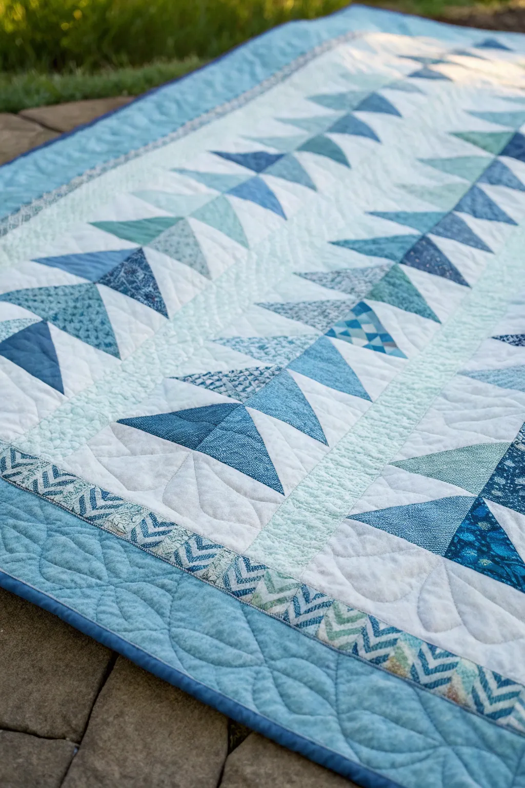 Serene blue flying geese borders for a tranquil vibe.