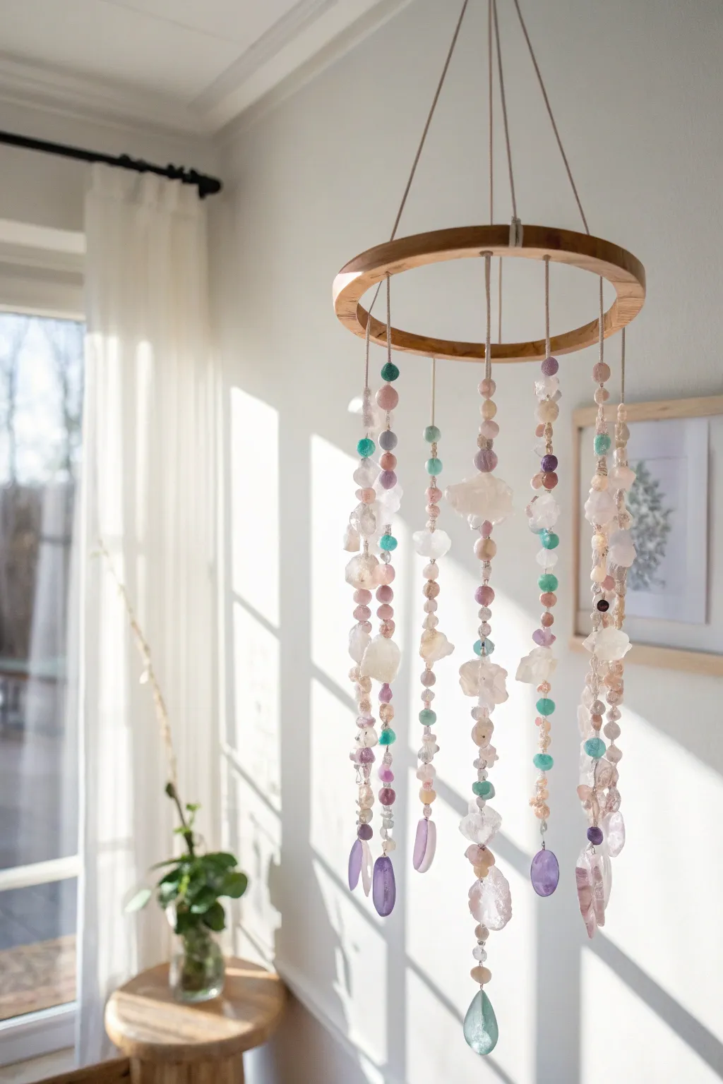Add a touch of whimsy and color to your home with a handcrafted gemstone chip mobile.