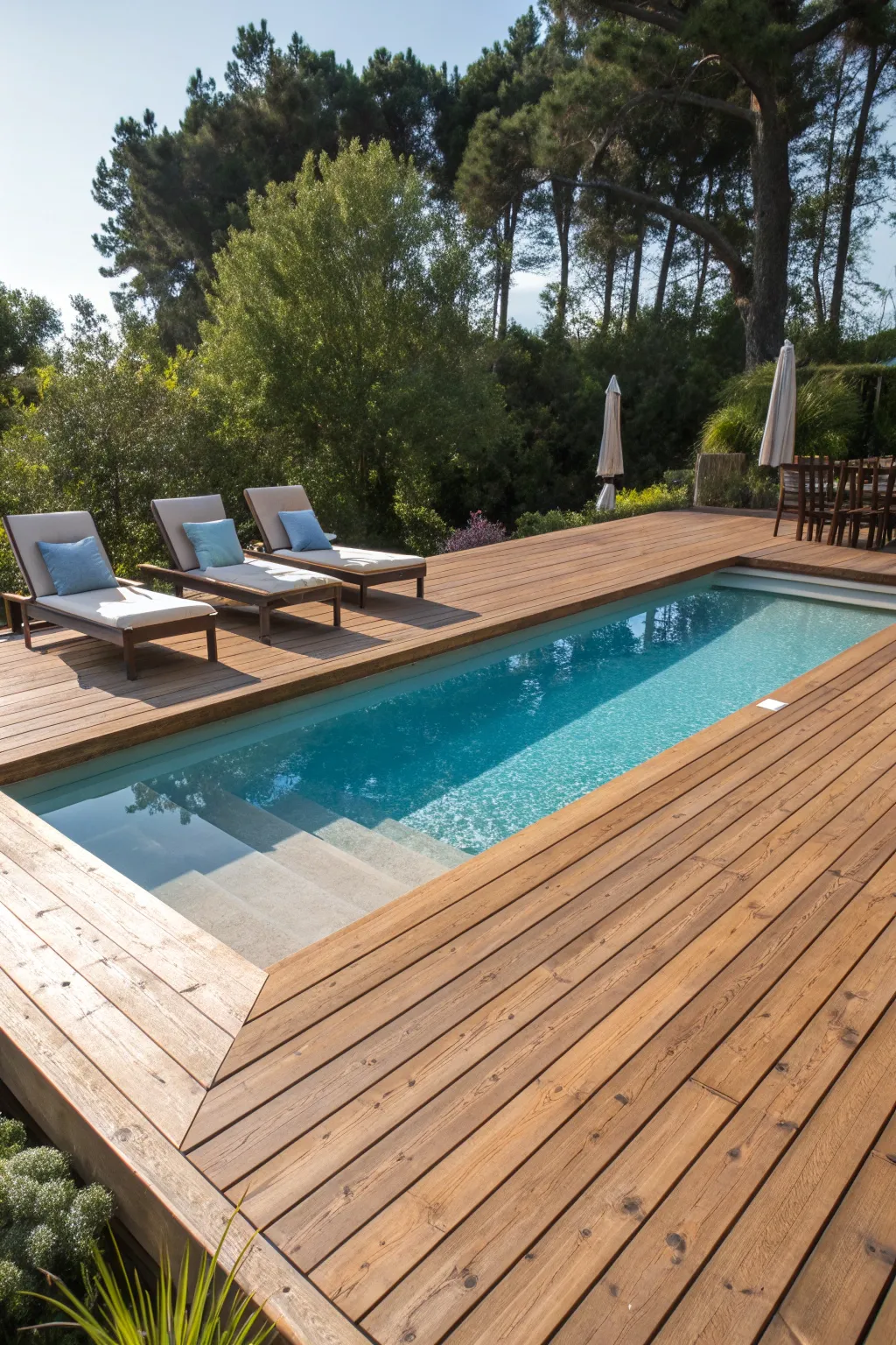 Elevate your backyard with a handcrafted wooden deck pool—where style meets relaxation.