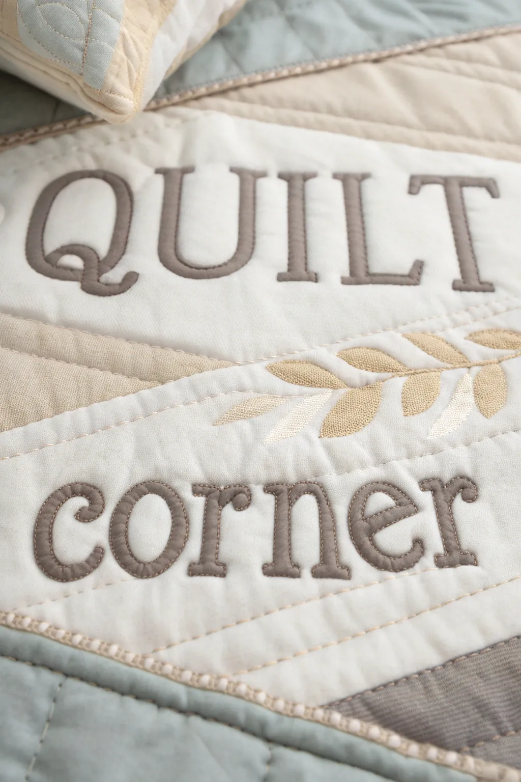 Elevate your quilt with personalized appliqué letters, blending minimalist elegance with a touch of boho charm.