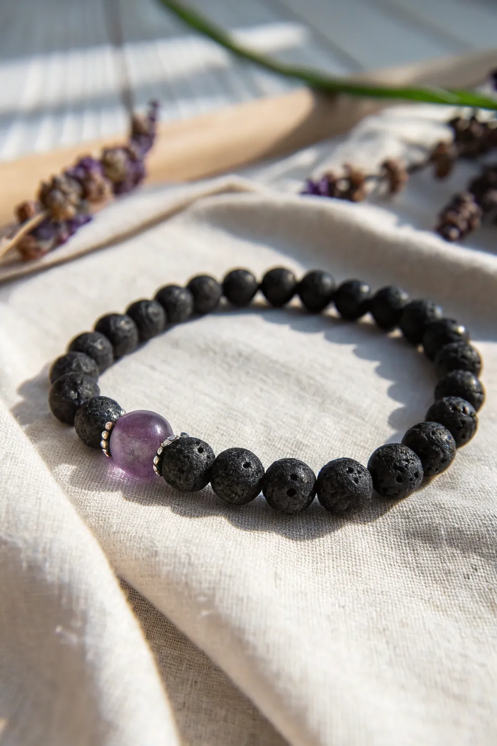Embrace the elegance of nature with this stunning lava bead bracelet, where raw meets refined.