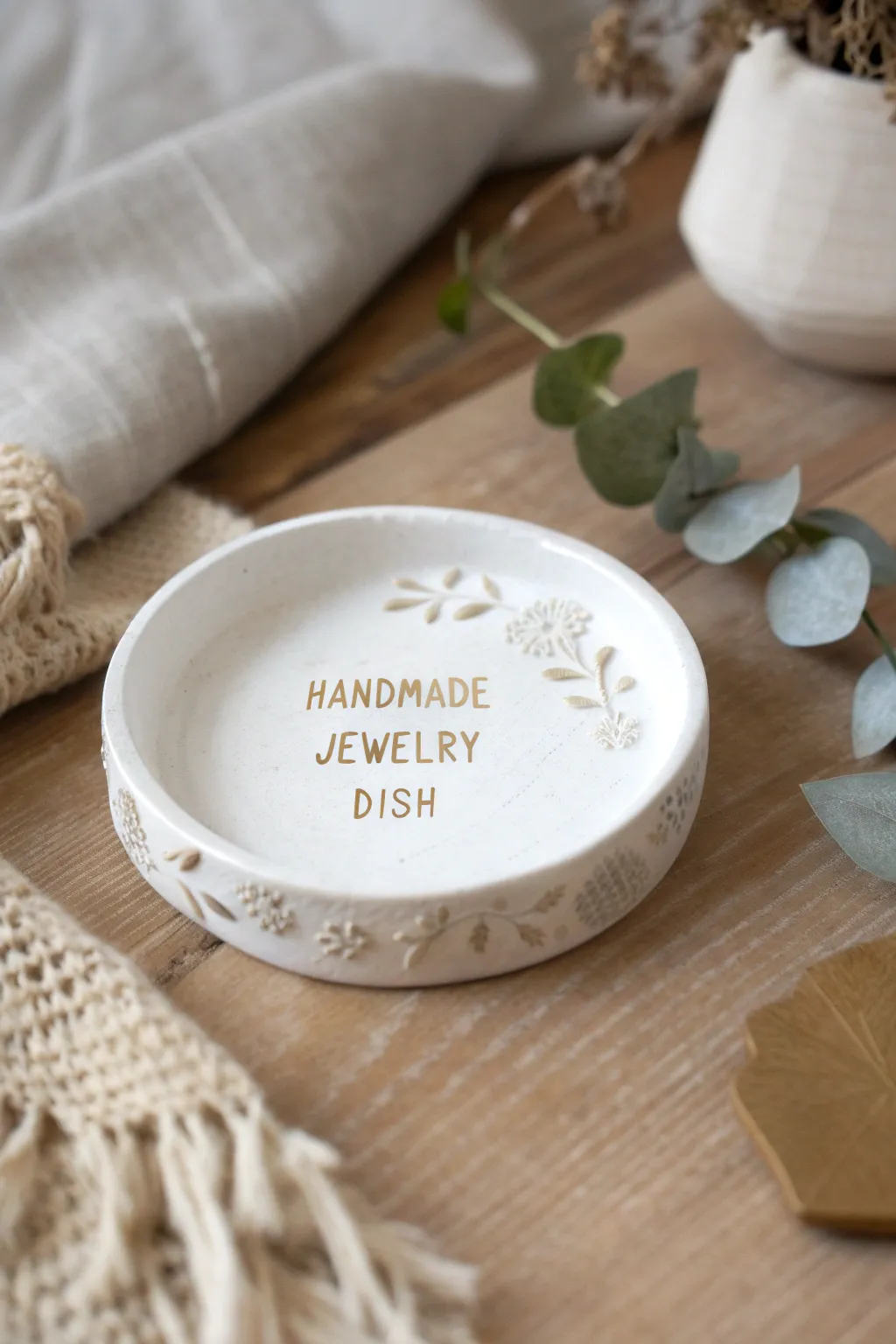 Celebrate her elegance with a handcrafted jewelry dish that combines minimalist beauty and personal charm.