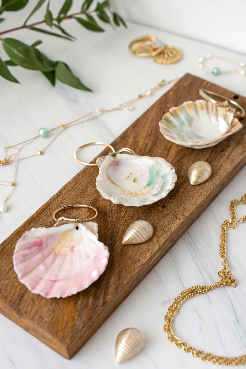 Elevate your jewelry display with these stunningly painted oyster shells - a perfect blend of minimalist and boho style.