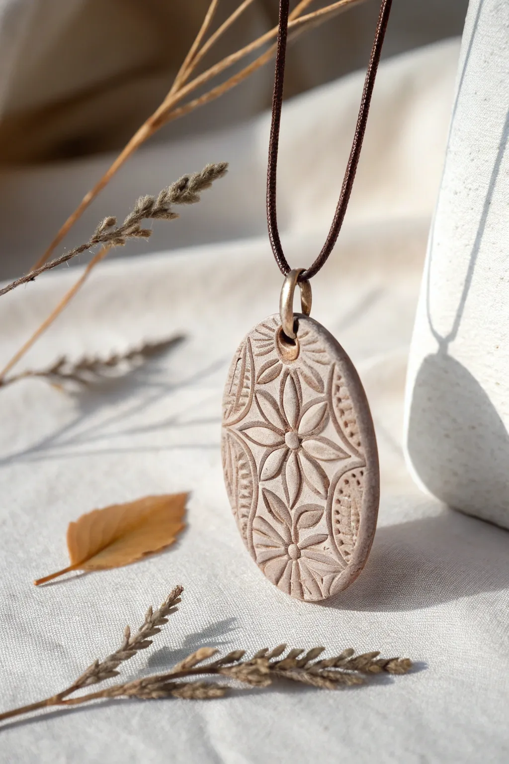 Elevate your holiday decor with handcrafted polymer clay pendants, blending minimalist elegance with artisanal charm.