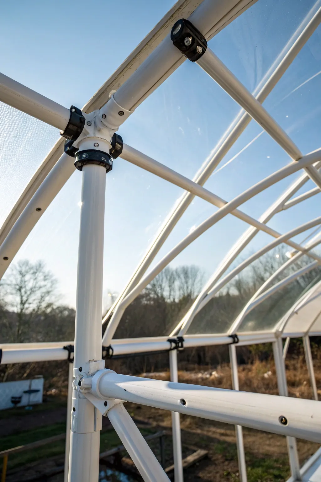 Discover the durability and elegance of a PVC and PEX hybrid greenhouse frame—where craftsmanship meets resilience.