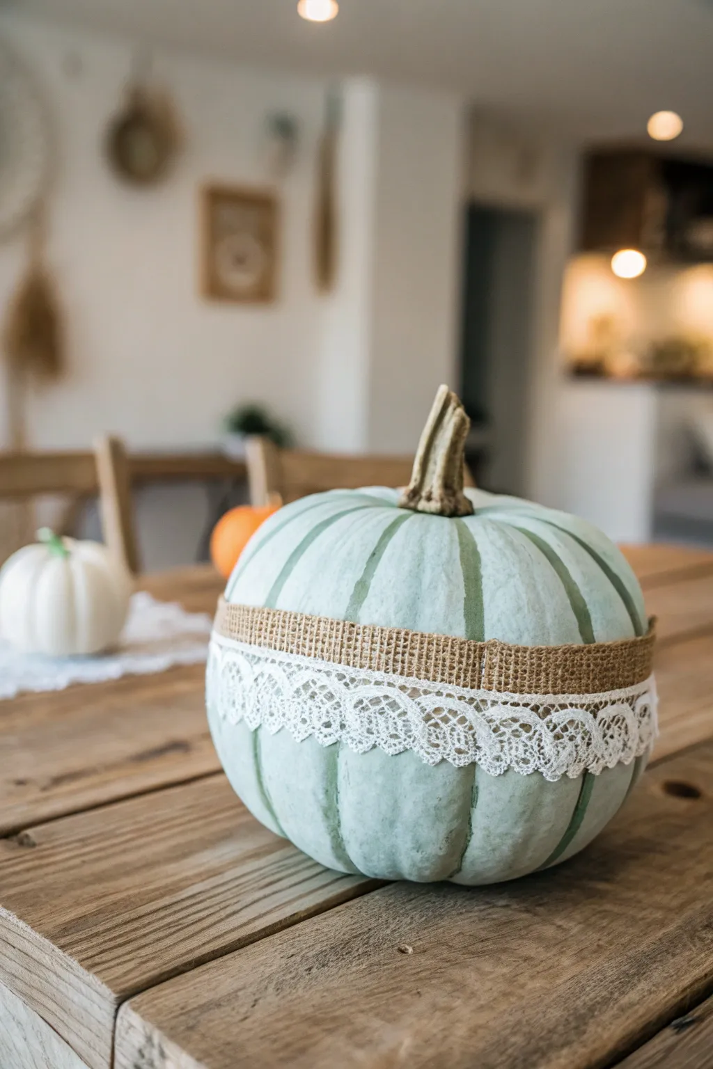 Embrace rustic elegance with this beautifully adorned pumpkin, a perfect blend of simplicity and charm.