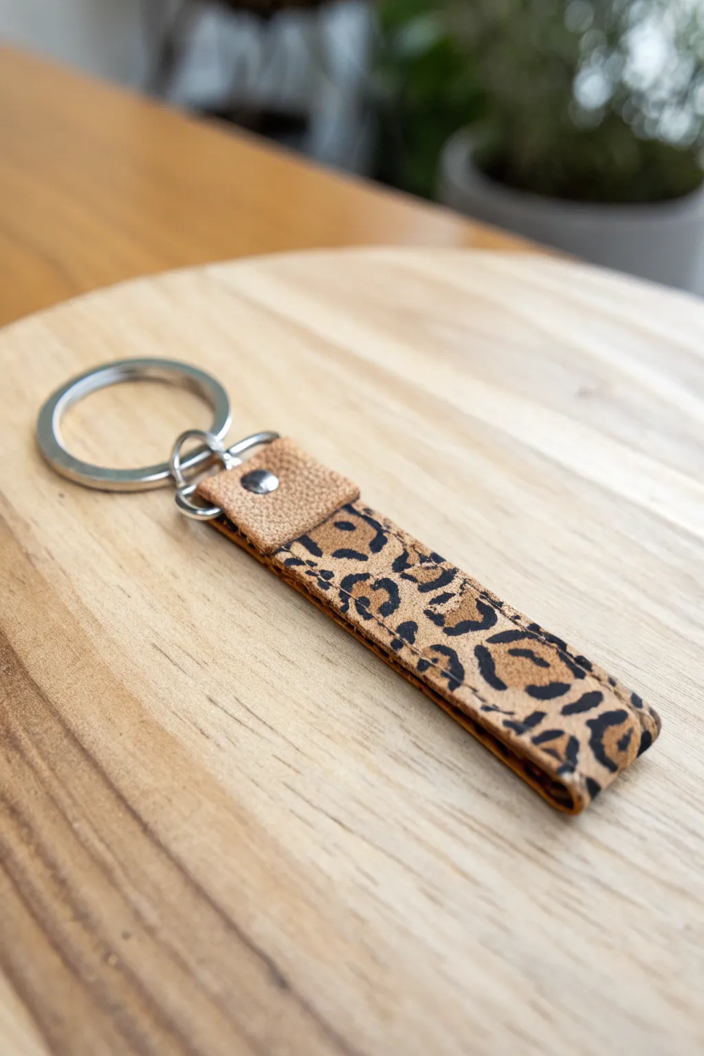 Unleash your wild side with this chic leopard print keychain – where minimalist design meets boho flair.