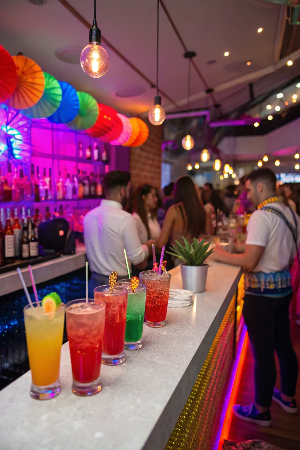 A signature mocktail bar with colorful drinks offers a fun and sophisticated party experience.