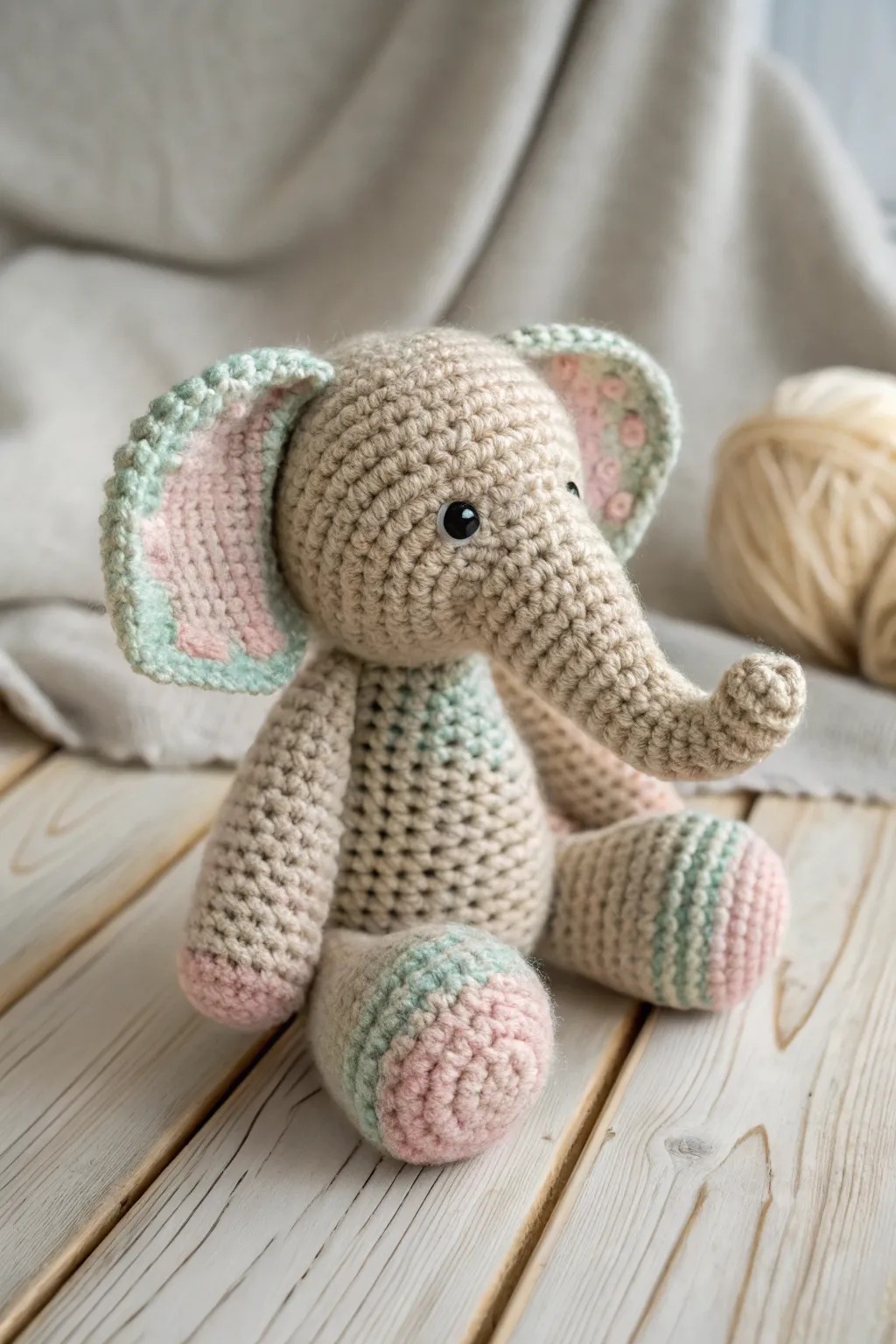 Delight in the charm of Tunisian crochet with this playful amigurumi elephant, a testament to simplicity and natural beauty.