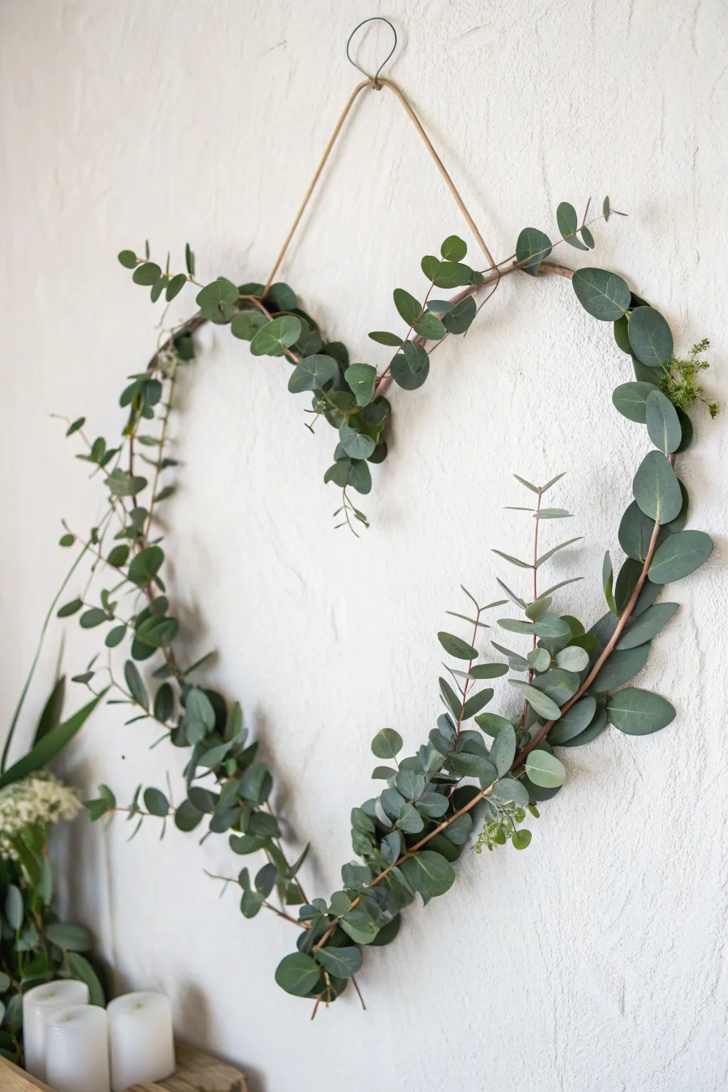 Embrace nature with this elegant DIY eucalyptus heart wreath. A perfect blend of minimalist charm and boho grace.
