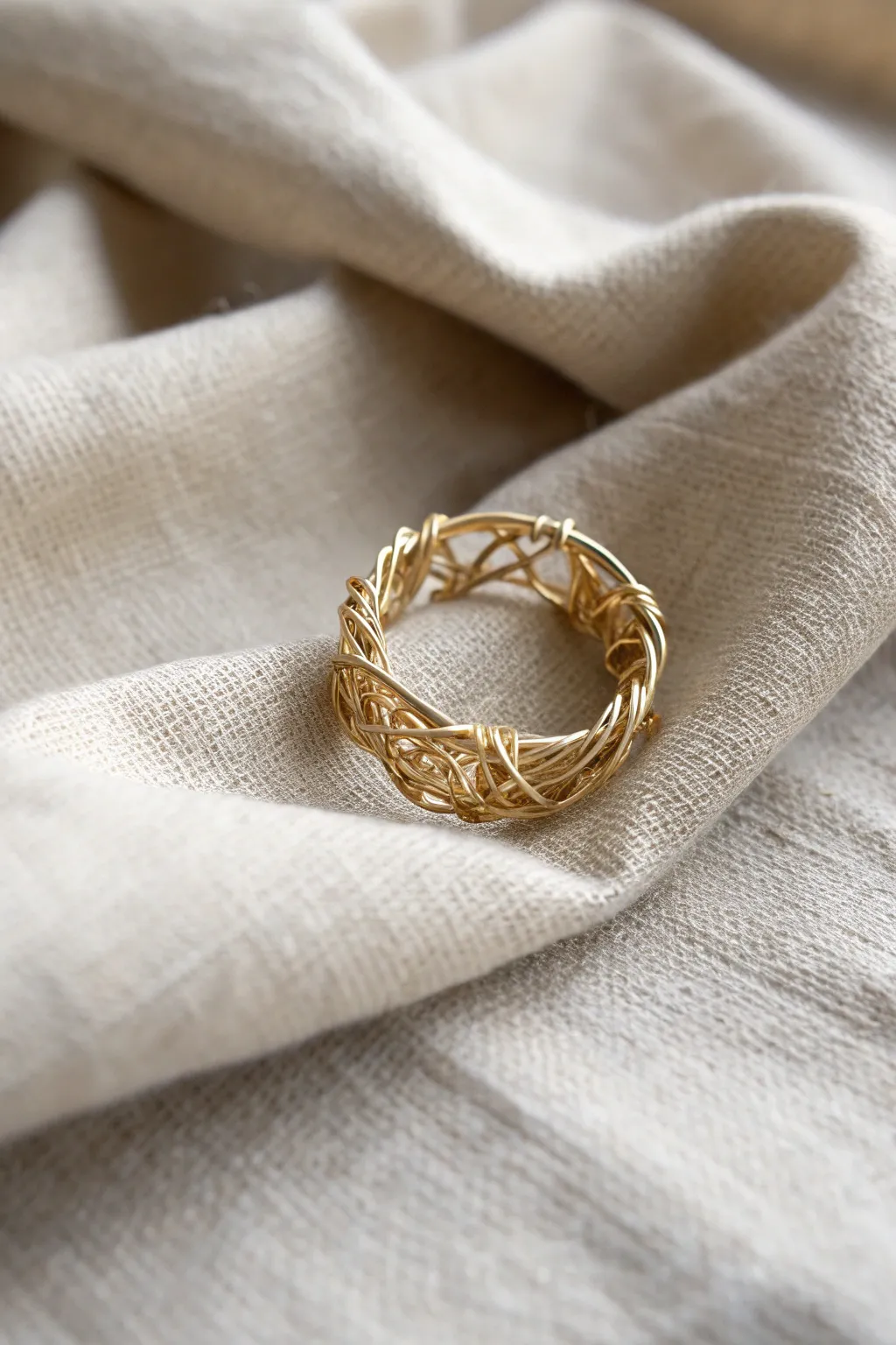 Embrace the art of simplicity with this elegant woven wire ring, where craftsmanship meets natural beauty.