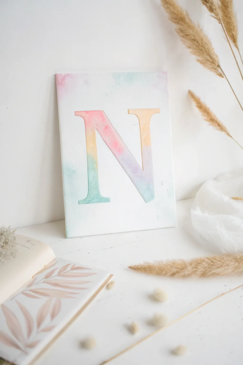 Embrace simplicity with pastel watercolor artistry—turn any space into a serene escape with this whimsical touch.