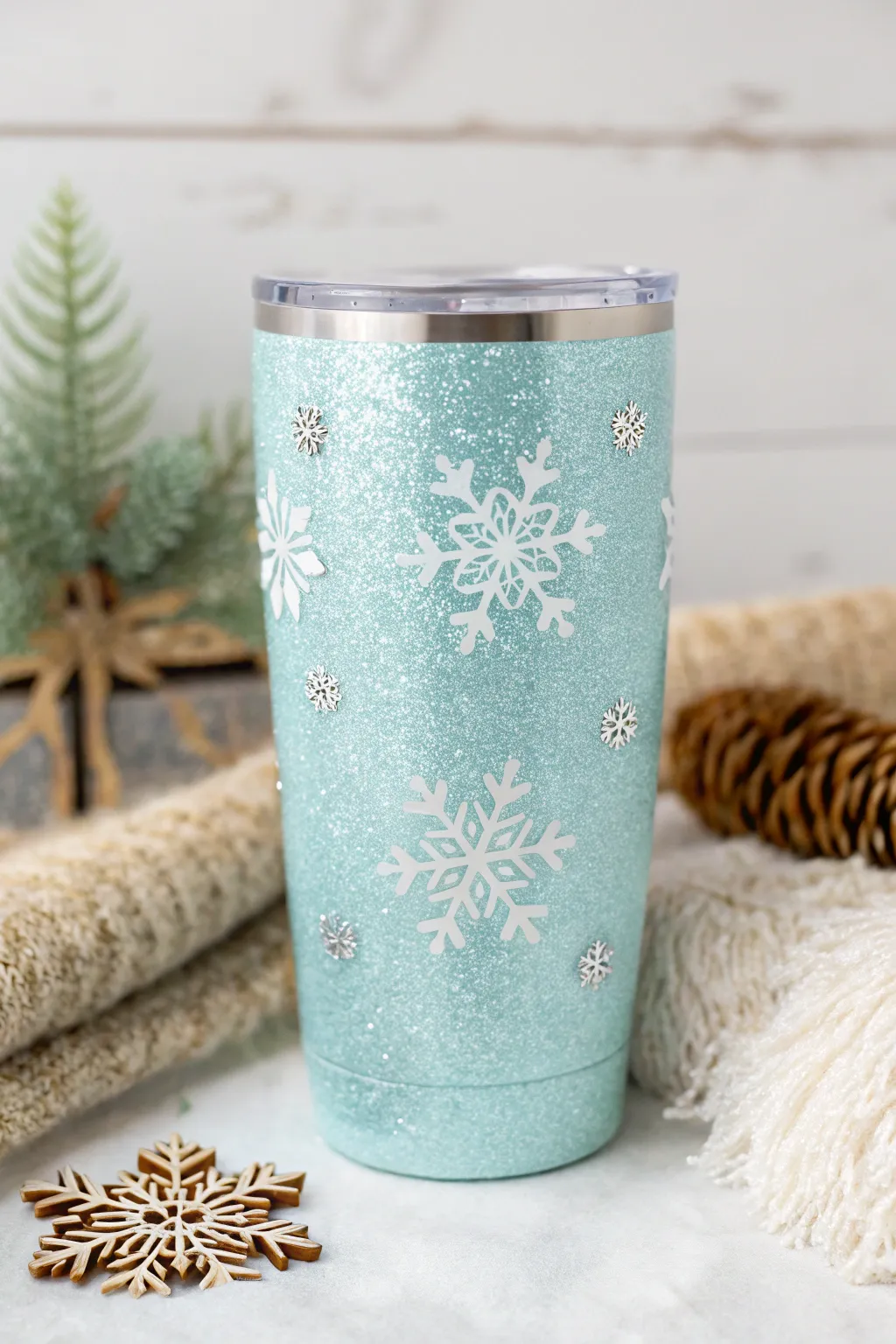 Embrace the magic of winter with this enchanting blue glitter tumbler, perfect for cozy holiday moments.