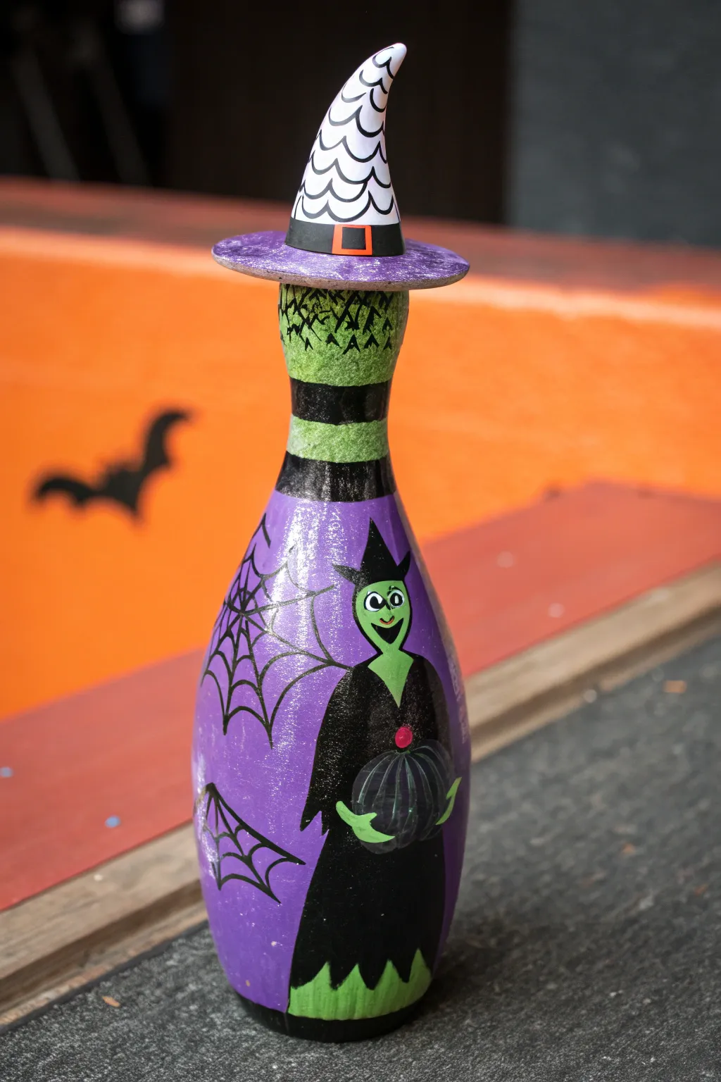 Enchant your Halloween decor with this bewitching bowling pin craft!