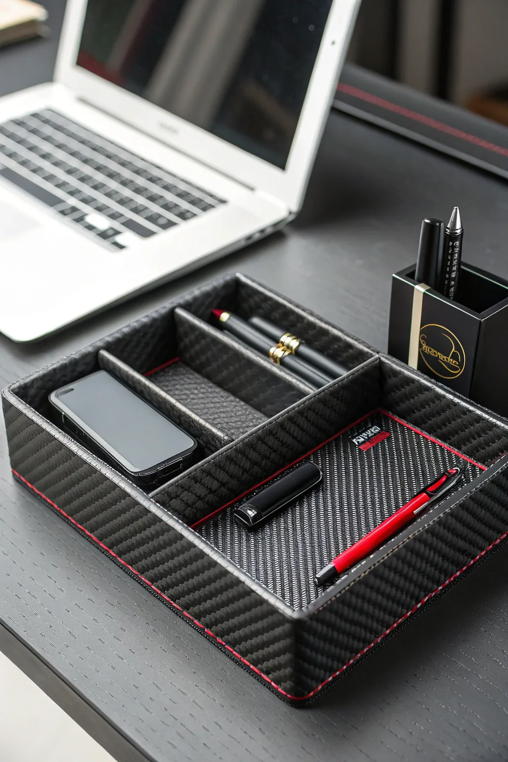 Elevate your workspace with this chic carbon fiber desk organizer, where style meets craftsmanship.