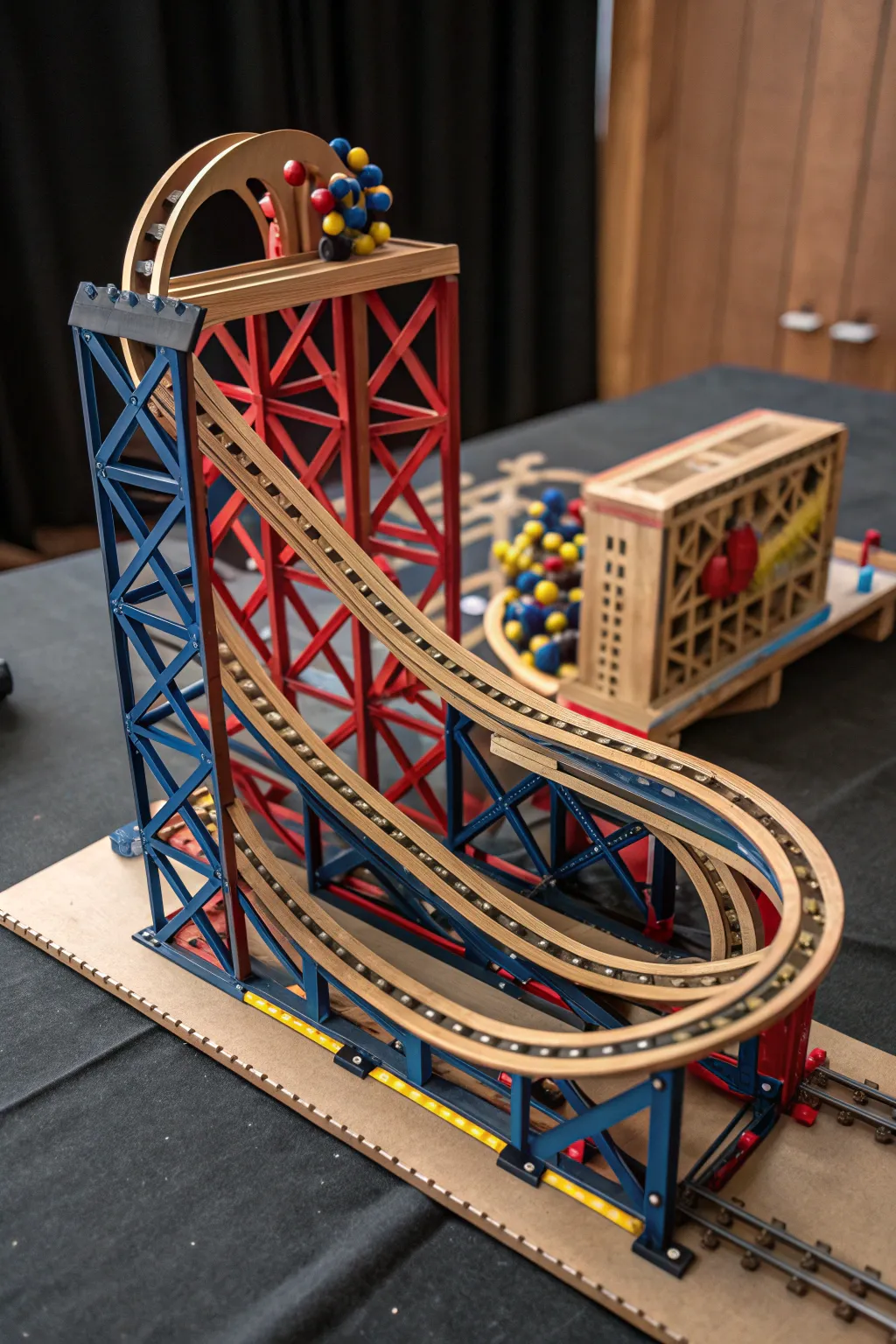 Unleash your imagination with this intricately designed cardboard roller coaster, where crisscross pathways turn creativity into craftsmanship.