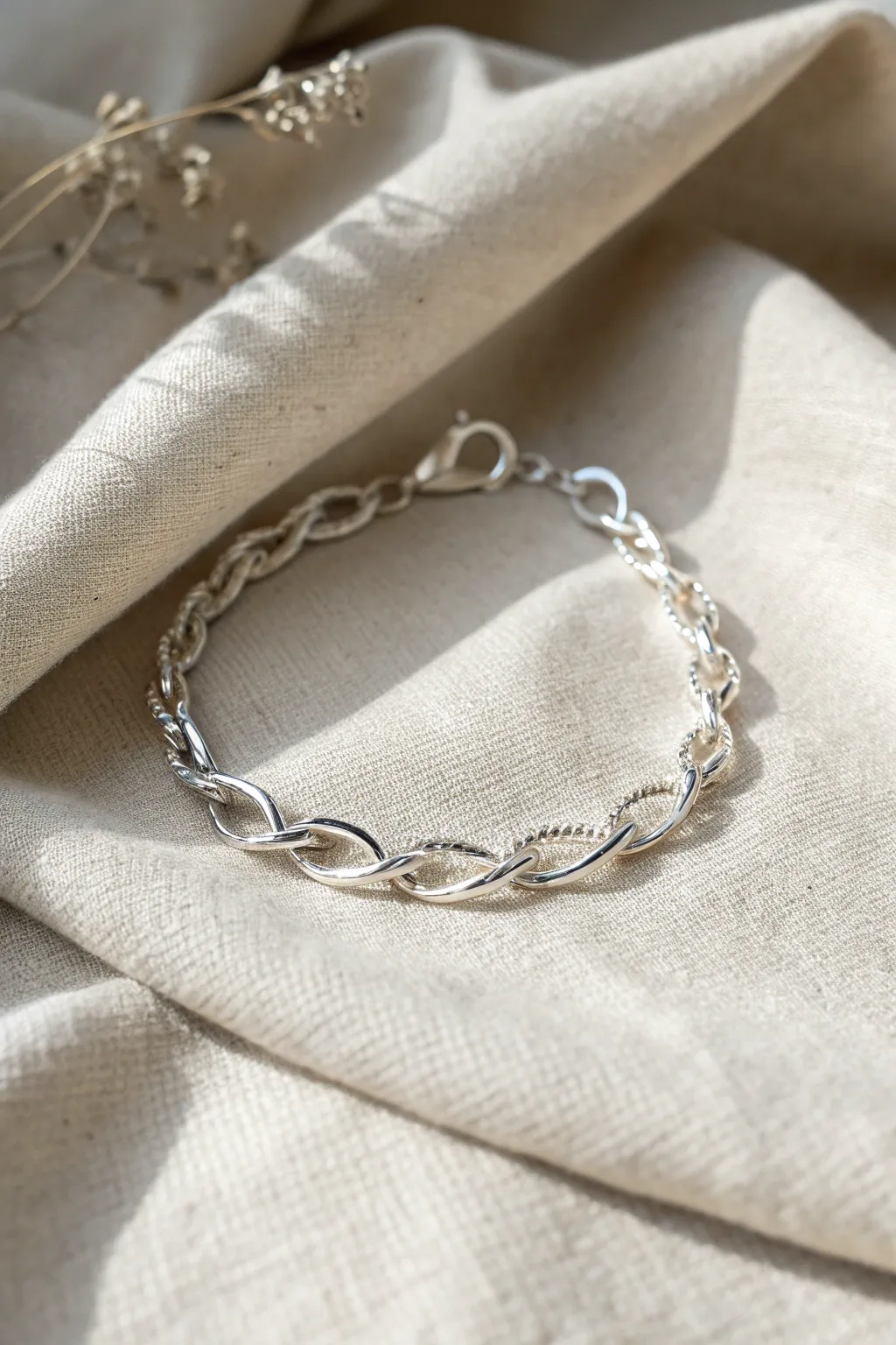Elegance in Simplicity: This monochrome silver bracelet is the perfect minimalist accessory for your holiday ensemble.