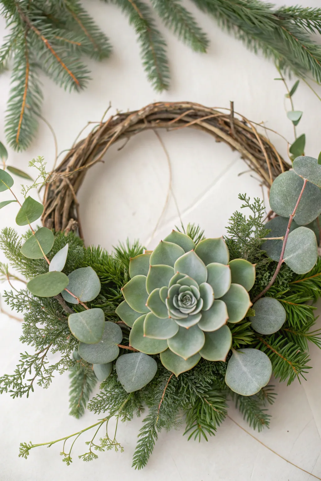 Embrace the unexpected with a succulent centerpiece for a modern, minimalist Christmas wreath.