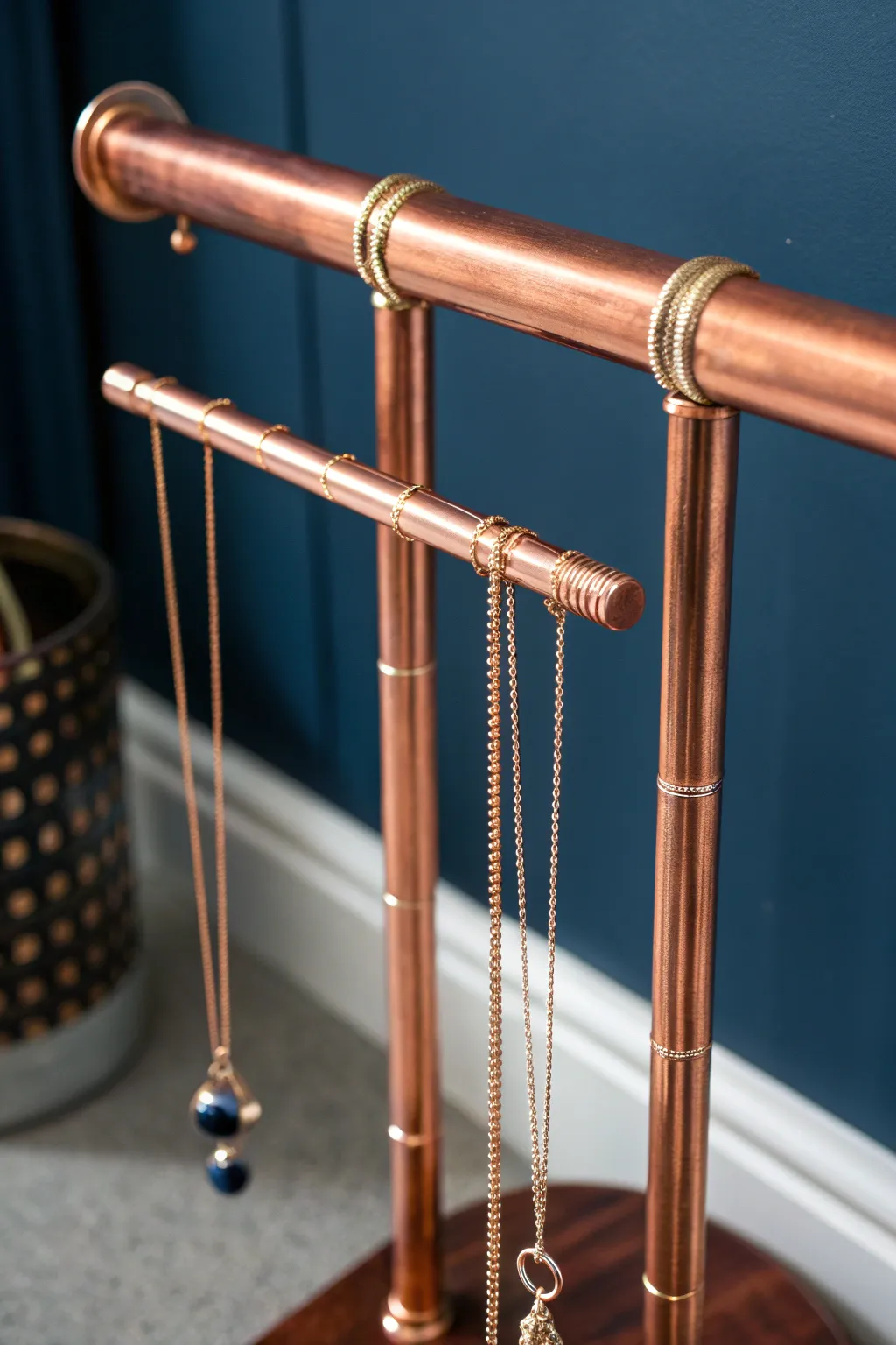 Elevate your style with a handcrafted copper pipe necklace holder.