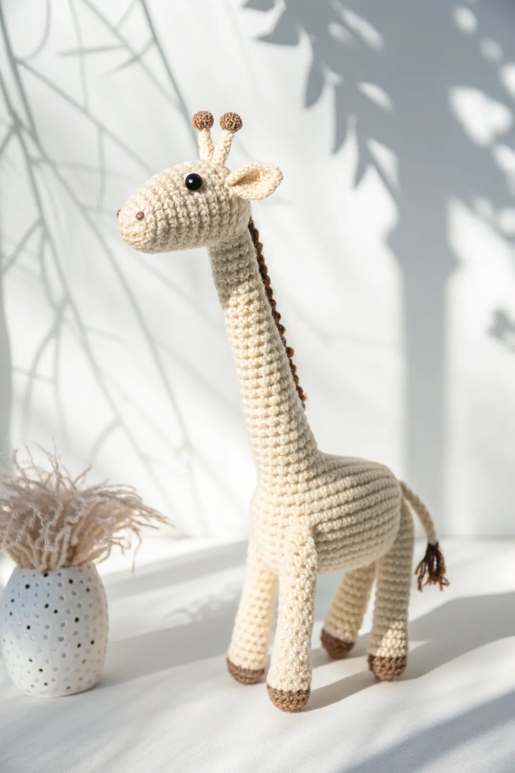 Reach for the sky with this charmingly crafted crochet giraffe, the perfect gentle giant for a serene nursery.