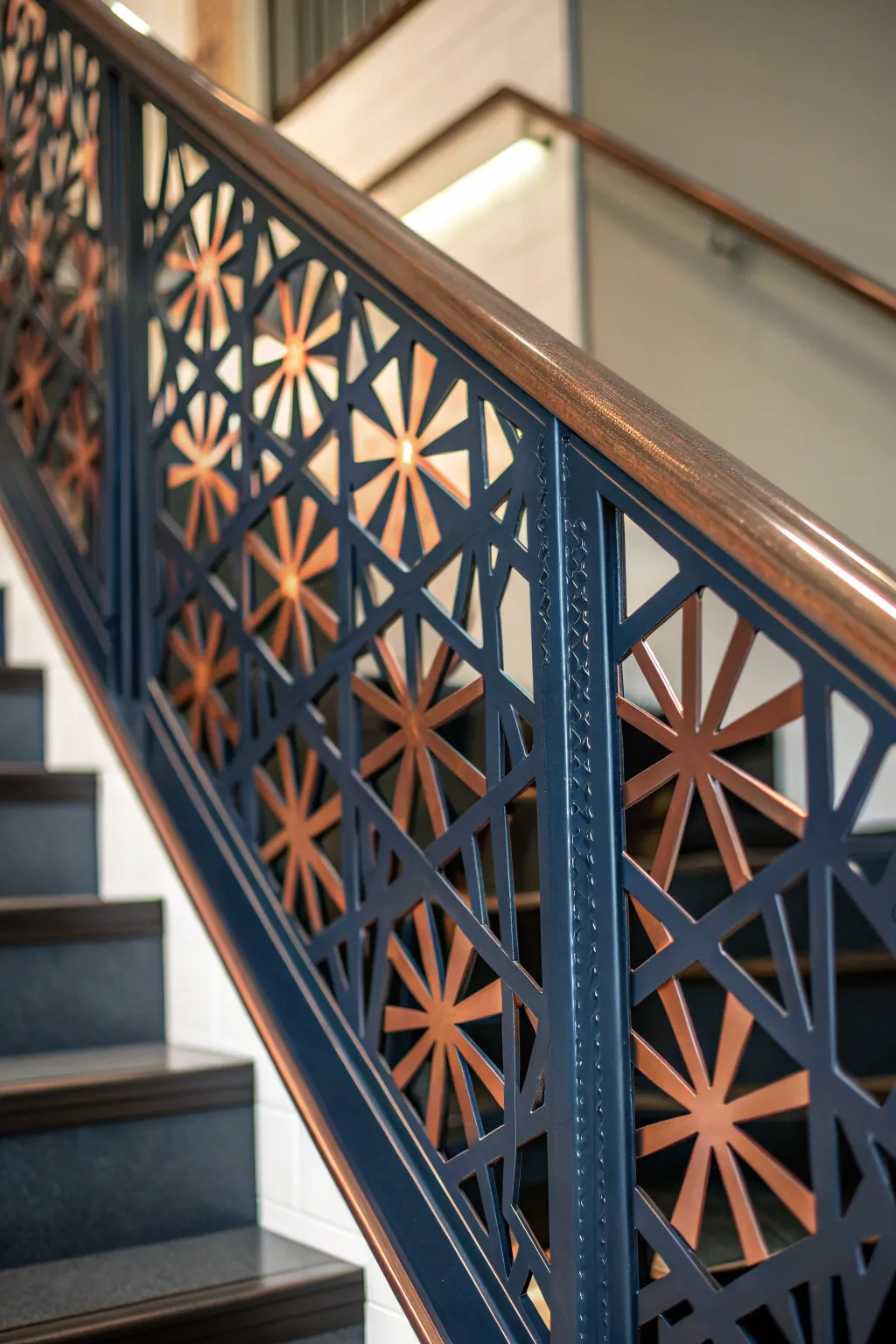 Elevate your staircase with custom geometric metal panels for a bold, modern look.