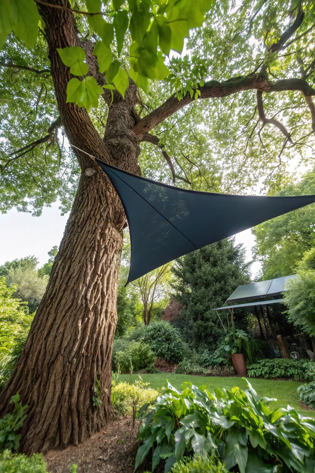 Transform your garden with nature's own anchor points. Discover the art of blending design and the great outdoors. #DIYShadeSail #Craftsmanship